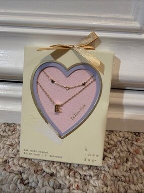 a new day Gold Layered Initial E Necklace with Heart Accents